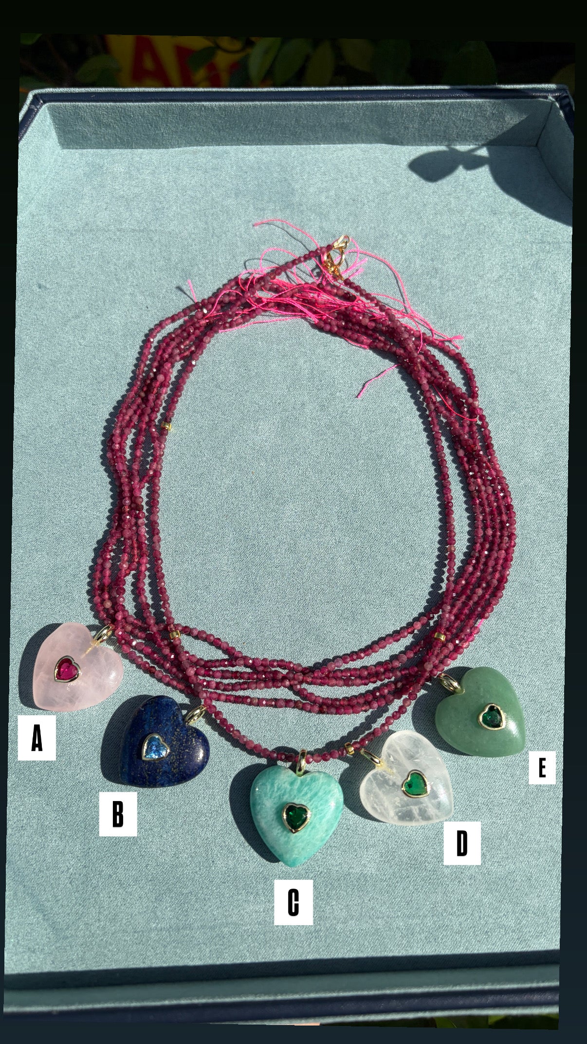 Pink tourmaline, gold accents, + gemstone hearts