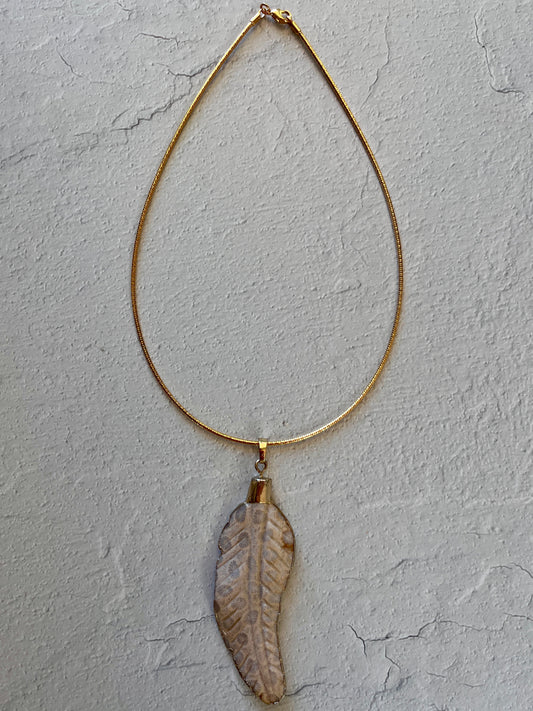 Coral Carved Feather on 15.5" Cord