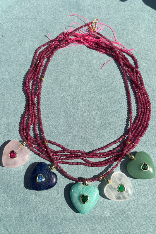 Pink tourmaline, gold accents, + gemstone hearts